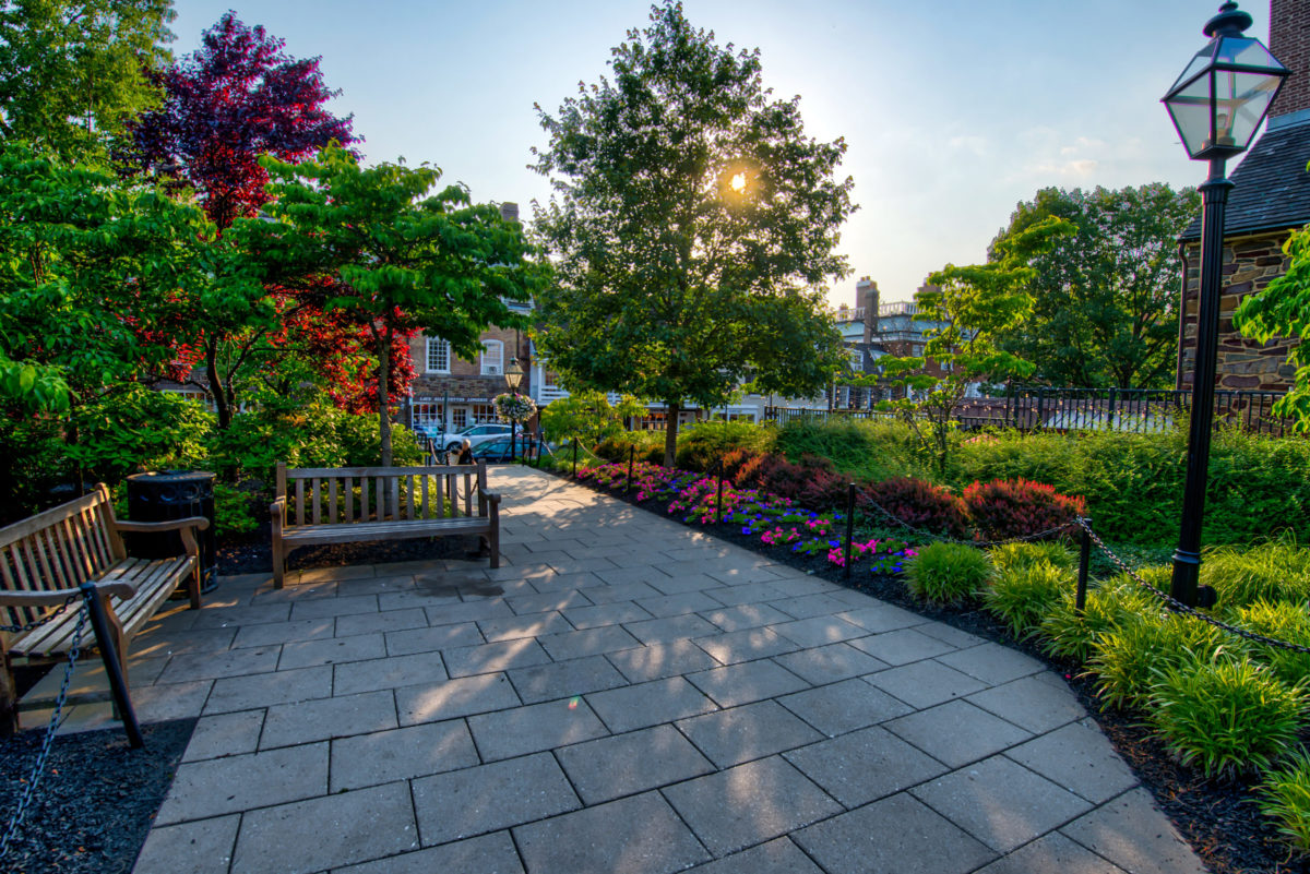 sun setting over spring scenery on Palmer Square