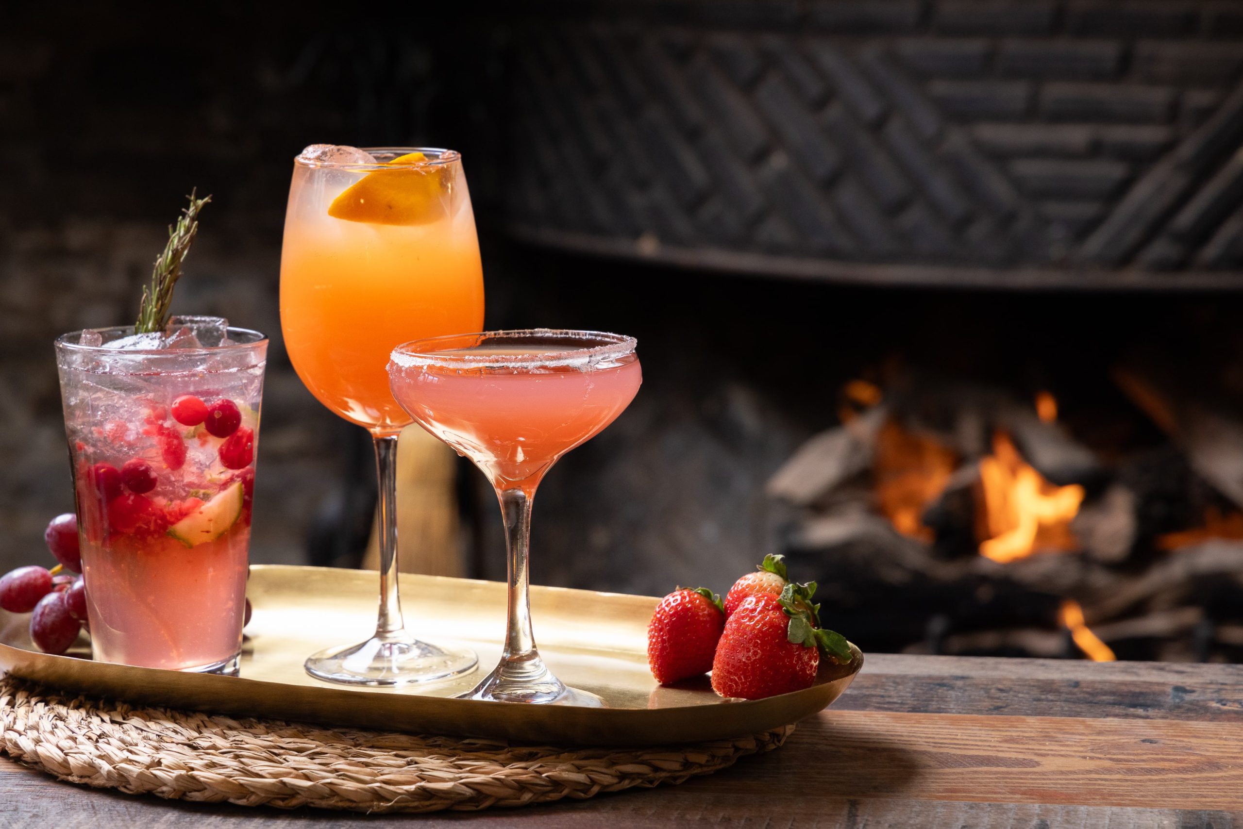 three cocktails by fire