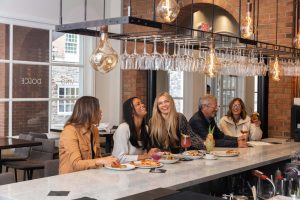 Friends enjoy drinks and appetizers at Teresa Caffe in Princeton, NJ.