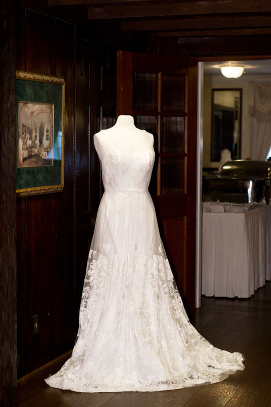 wedding dress displayed on a bust