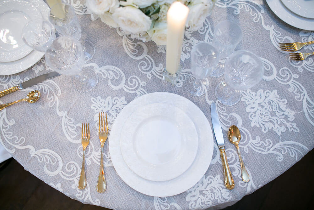 place setting with gold utensils