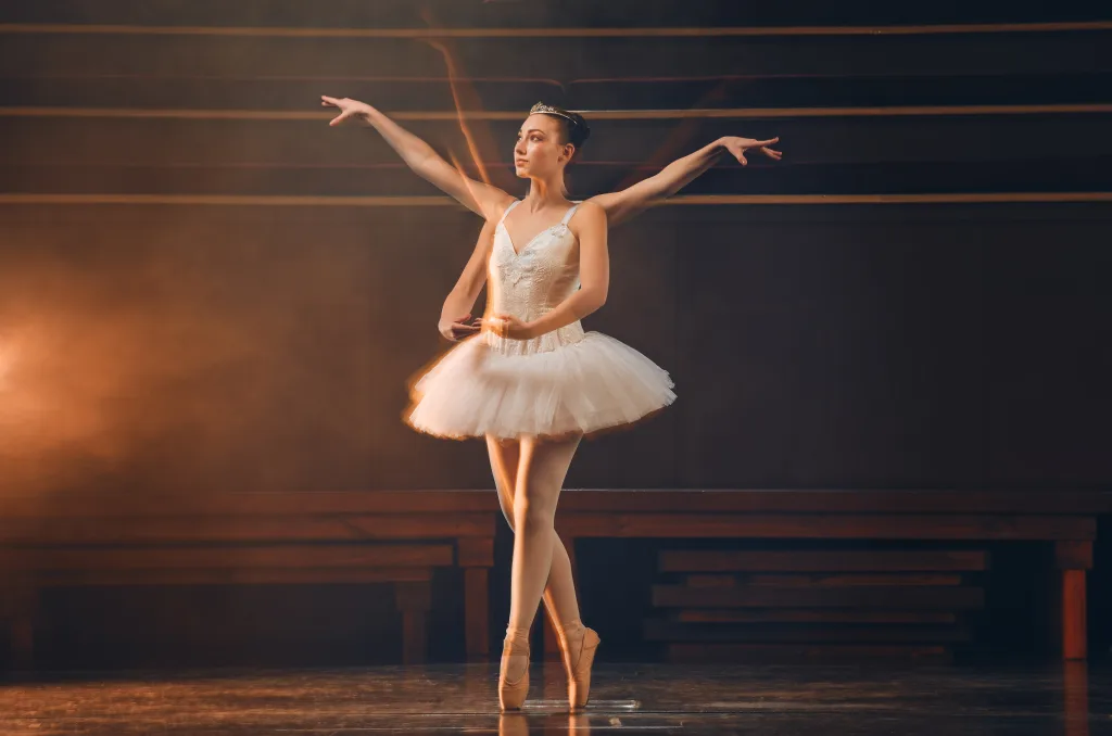 shot of a young woman practicing her routine in a stage