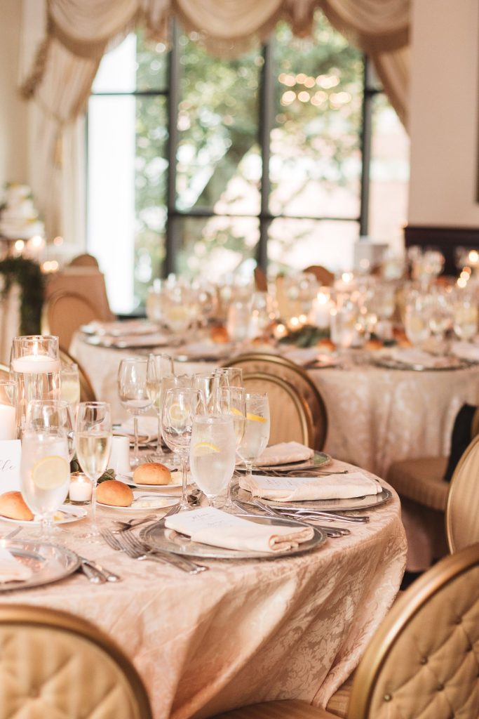 wedding reception table with champagne glasses