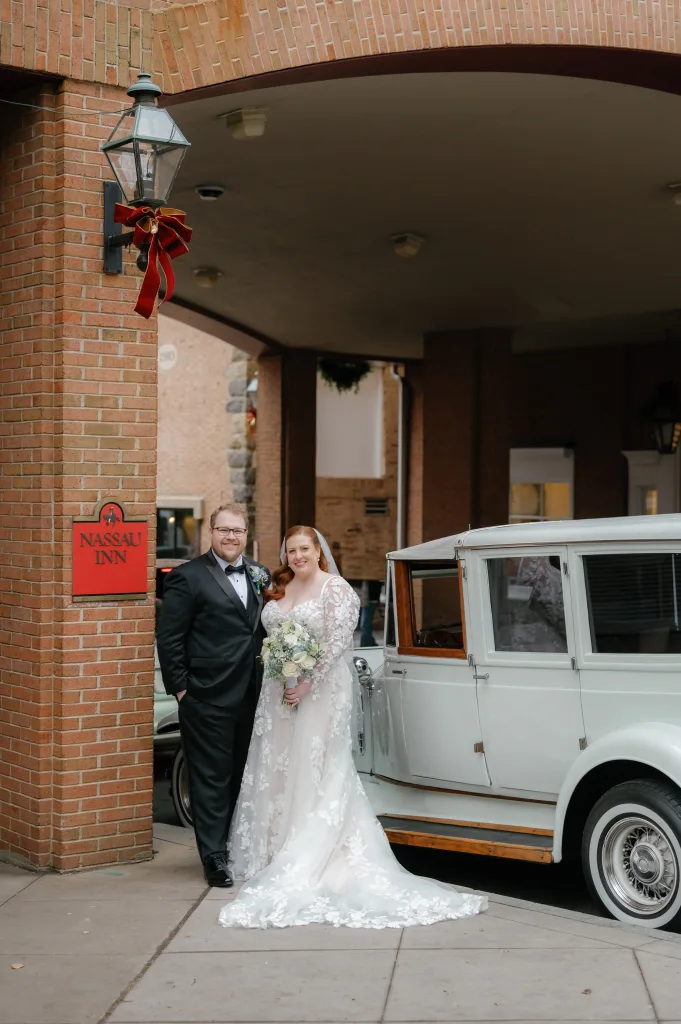 couple's wedding portrait with old fashion car