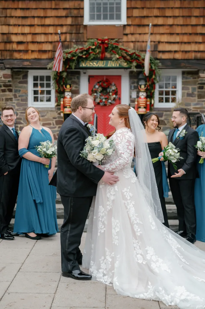 couple's portrait outside with bridal party