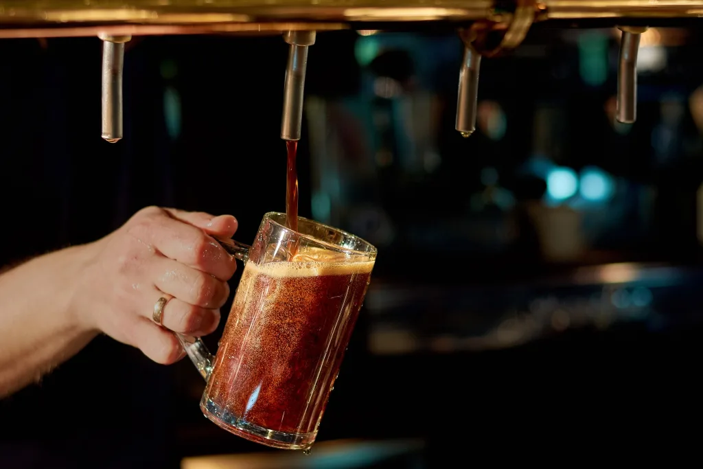 pouring fresh alcoholic beverage.